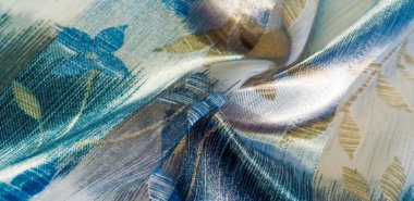 desen, şekil, arka plan. Bu güzel kumaş metalik gümüş kayganlaştırıcı ile süslenmiş soyut bir deseni var, bu da büyük bir görsel ilgi uyandırıyor. Tasarımlarınıza zarafet eklemek için ideal