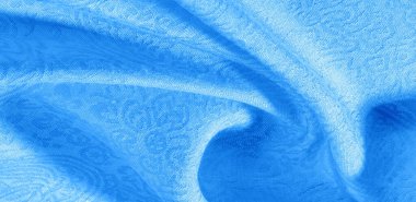 Arkaplan desenli kumaş çiçekli süs mavisi. Bu pamuk baskısı koleksiyonu parlak renkler ve şirin temalarla ayırt edilir. Herhangi bir proje, tasarım ve çevrimiçi dekor ögeleri için ideal.