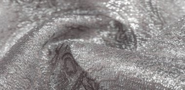 Doku arka planı, desen. Beyaz ipek kumaş. Organza brokar kumaş. Çoban, gevrek palmiyeli. Geniş iplik boyalı bir çiçek deseni var..