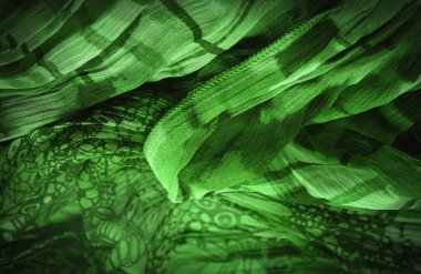 Arkaplan dokusu, dekoratif süs, koyu lacivert ipek kumaş, çiçek deseni, kıvrım, resif, dalgalı, dalgalı, dalgalı, küçük dalga veya kumaşın yüzeyinde bir dizi dalga,