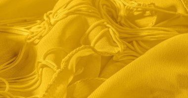 Arka plan, desen, doku, duvar kağıdı, sarı soluk ipek kumaş parlak bir parlaklık vardır. Bu en çok yönlü kumaştır. Tasarımınızın güzel vurgularıyla yaratıcı olun.