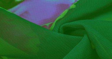 Doku, arkaplan, mavi çiçekli yeşil ipek kumaş. Projeleriniz stüdyomuzda son ürünlerini kullanma konusunda derin bilgiye sahip tasarımcılar tarafından geliştirildi..