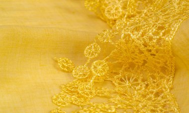 Doku, arkaplan, desen, kartpostal, ipek kumaş, dantel ambalajlı kadın sarı atkısı. Yazdırma ve dijital materyallerinizi oluşturmak için bu süslü resimleri kullanın.