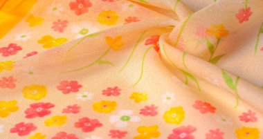 Doku arka planı, ipek kumaş, bej arka planda küçük çiçekler, ince dikiş. Kırmızı, bej renkli ton. Çiçek tasarımı