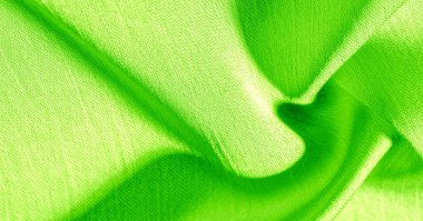 Arka plan, desen, doku, duvar kağıdı, yeşil ipek kumaş. Pürüzsüz bir mat yüzeyi vardır. Tasarımdan projelerinize kadar her şey için bu lüks kumaşı kullanın. Olasılıklar gerçekten sonsuzdur.!