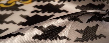 Arkaplan dokusu, dekoratif süs, ipek kumaş tarçın bej ve sarı, resim, geometrik, çiçekli veya diğer elementlerin kombinasyonunun grafik dekorasyonu.