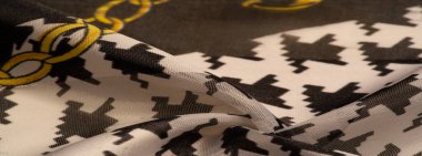 Arkaplan dokusu, dekoratif süs, ipek kumaş tarçın bej ve sarı, resim, geometrik, çiçekli veya diğer elementlerin kombinasyonunun grafik dekorasyonu.