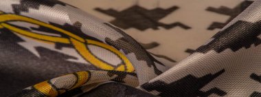 Arkaplan dokusu, dekoratif süs, ipek kumaş tarçın bej ve sarı, resim, geometrik, çiçekli veya diğer elementlerin kombinasyonunun grafik dekorasyonu.