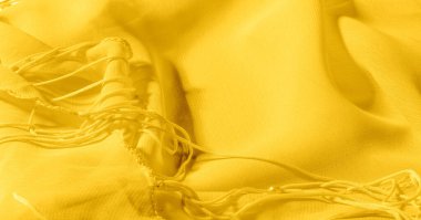 Arka plan, desen, doku, duvar kağıdı, sarı soluk ipek kumaş parlak bir parlaklık vardır. Bu en çok yönlü kumaştır. Tasarımınızın güzel vurgularıyla yaratıcı olun.