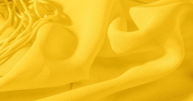 Arka plan, desen, doku, duvar kağıdı, sarı soluk ipek kumaş parlak bir parlaklık vardır. Bu en çok yönlü kumaştır. Tasarımınızın güzel vurgularıyla yaratıcı olun.