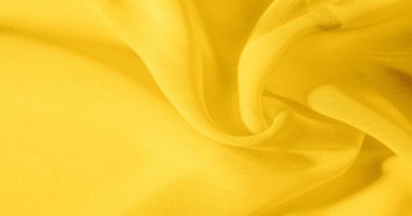 Arka plan, desen, doku, duvar kağıdı, sarı soluk ipek kumaş parlak bir parlaklık vardır. Bu en çok yönlü kumaştır. Tasarımınızın güzel vurgularıyla yaratıcı olun.