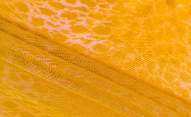 Doku, arkaplan, desen, beyaz sarı ipek kumaş tekstil. Özellikleri, daha esnek ve tasarlanması daha kolay olduğu için dokuma malzemesinden farklıdır..