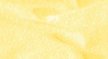 arka plan, desen, doku, süs, vintage. yapay granüller ile sarı kumaş. pelet rulo. Bu yüksek kaliteli, hafif, pürüzsüz kollu streç pamuklu kumaş