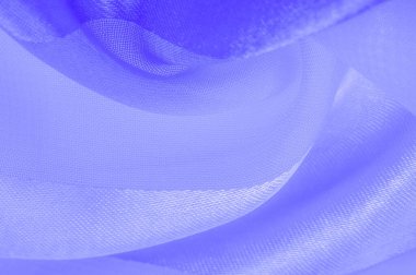 Doku, arkaplan, metalik parıltılı mavi ipek çizgili kumaş. Eğer kötü bir ruh halin varsa, bu kumaş onu eşi görülmemiş yüksekliklere taşıyacaktır. Projeniz başarılı olacak..