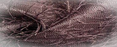 Arkaplan dokusu, dekoratif süs, kahverengi ipek kumaş, kumaşta dokuma iplikleri, kabarık efekt, his, görünüş veya bir yüzey veya maddenin dokusu.