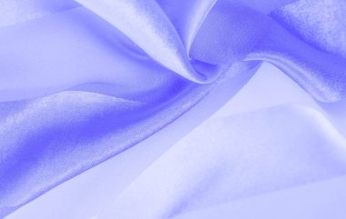 Doku, arkaplan, metalik parıltılı mavi ipek çizgili kumaş. Eğer kötü bir ruh halin varsa, bu kumaş onu eşi görülmemiş yüksekliklere taşıyacaktır. Projeniz başarılı olacak..