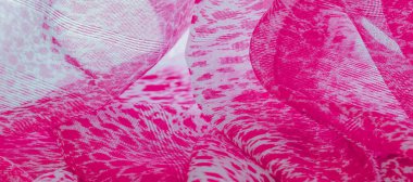 Beyaz kırmızı rengin dokusu, arkaplanı, deseni, ipek kumaşı tekstil. Özellikleri, daha esnek ve tasarlanması daha kolay olduğu için dokuma malzemesinden farklıdır..