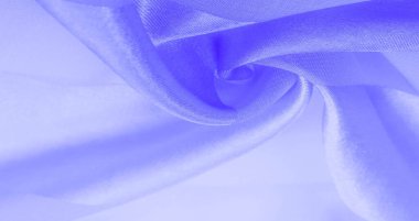 Doku, arkaplan, metalik parıltılı mavi ipek çizgili kumaş. Eğer kötü bir ruh halin varsa, bu kumaş onu eşi görülmemiş yüksekliklere taşıyacaktır. Projeniz başarılı olacak..