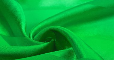 Doku, arkaplan, metalik parıltılı yeşil ipek çizgili kumaş. Eğer kötü bir ruh halin varsa, bu kumaş onu eşi görülmemiş yüksekliklere taşıyacaktır. Projeniz başarılı olacak..