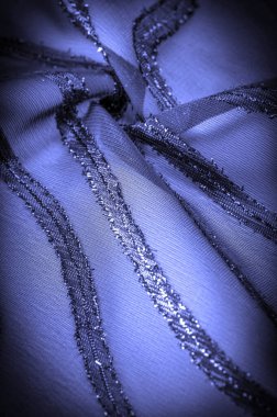 Doku arkaplan resmi, kumaş şeffaf koyu mavi, parlak doğuştan gelen çizgilerle, ışığın içinden geçmesine izin veren madde, böylece nesneler açıkça görülebilir..