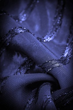 Doku arkaplan resmi, kumaş şeffaf koyu mavi, parlak doğuştan gelen çizgilerle, ışığın içinden geçmesine izin veren madde, böylece nesneler açıkça görülebilir..