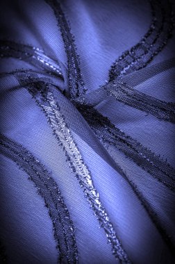 Doku arkaplan resmi, kumaş şeffaf koyu mavi, parlak doğuştan gelen çizgilerle, ışığın içinden geçmesine izin veren madde, böylece nesneler açıkça görülebilir..