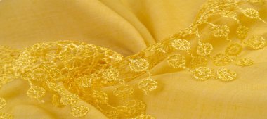 Doku, arkaplan, desen, kartpostal, ipek kumaş, dantel ambalajlı kadın sarı atkısı. Yazdırma ve dijital materyallerinizi oluşturmak için bu süslü resimleri kullanın.