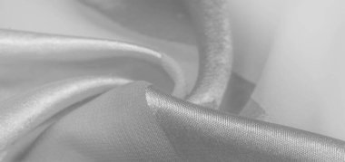 Doku, arkaplan, metalik parıltılı beyaz ipek çizgili kumaş. Eğer kötü bir ruh halin varsa, bu kumaş onu eşi görülmemiş yüksekliklere taşıyacaktır. Projeniz başarılı olacak..