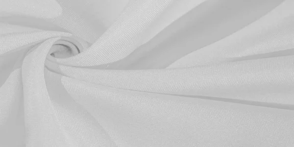 Texture, background, pattern, silk fabric of white color, solid light white silk satin fabric of the duchess Really beautiful silk fabric with satin sheen. Perfect for your design, wedding invitations for special occasions.