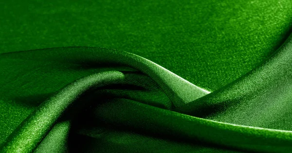stock image Background, pattern, texture, wallpaper, green silk fabric. Add a touch of luxury to any design by adding it to this ultra-soft and very lightweight polyester lining fabric.