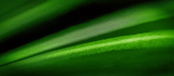 テクスチャ背景パターン 緑の絹織物のパノラマ写真 絹の公爵気分サテンは美しく 王室の絹の生地です 輝く輝きを持っています — ストック写真