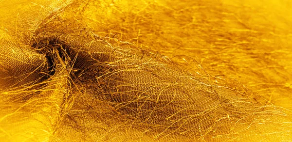 背景の質感 装飾品 黄色の金の絹の生地 織物に織り糸 ふわふわの効果 外観または表面または物質の質感 — ストック写真