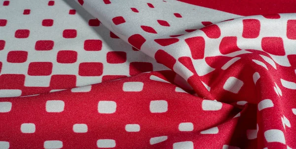 texture background pattern. silk fabric with a pattern of red squares on a white background. This is a heavy square 100% polyester pattern that fits perfectly with modern