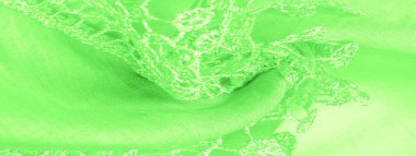 Doku, arkaplan, desen, kartpostal, ipek kumaş, dantel ambalajlı kadın bahar yeşil atkısı. Yazdırma ve dijital materyallerinizi oluşturmak için bu süslü resimleri kullanın.