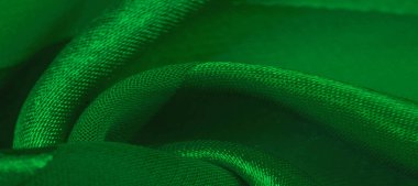 Doku, arkaplan, metalik parıltılı yeşil ipek çizgili kumaş. Eğer kötü bir ruh halin varsa, bu kumaş onu eşi görülmemiş yüksekliklere taşıyacaktır. Projeniz başarılı olacak..