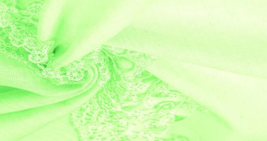 Doku, arkaplan, desen, kartpostal, ipek kumaş, dantel ambalajlı kadın bahar yeşil atkısı. Yazdırma ve dijital materyallerinizi oluşturmak için bu süslü resimleri kullanın.