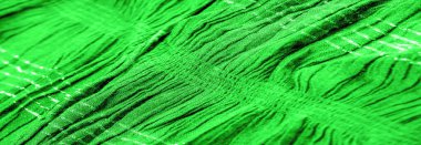 Arkaplan dokusu, süs süsü, zümrüt yeşili kıvrımlı kumaş, paralel veya çapraz kıvrımlı kumaş; böyle bir kumaştan çıkan ürünler..