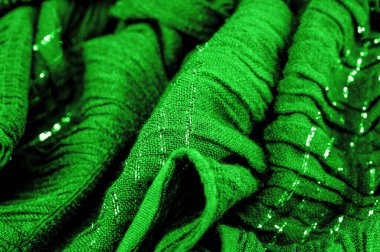 Arkaplan dokusu, süs süsü, zümrüt yeşili kıvrımlı kumaş, paralel veya çapraz kıvrımlı kumaş; böyle bir kumaştan çıkan ürünler..
