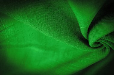 Duvar kağıdının dokusu, süs süsü, yeşil sentlik koyu zümrüt ipeği kumaşı, dekoratif elementler ekleyerek daha çekici hale getirebilirsiniz.