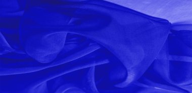 Mavi ipek kumaş dokusu. Tasarımınız, giysileriniz ve posterleriniz için de mükemmel. Güzel proje aksanlarıyla yaratıcı ol. Bu kumaş senin ilham kaynağın..