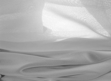 doku arkaplan deseni. İnce bir mat parıltısı olan beyaz ipek kumaş. Dizaynınız, aksanınız, duvar kağıtlarınız, posterleriniz ve kartpostallarınız için mükemmel..