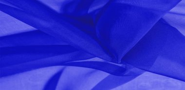 Mavi ipek kumaş dokusu. Tasarımınız, giysileriniz ve posterleriniz için de mükemmel. Güzel proje aksanlarıyla yaratıcı ol. Bu kumaş senin ilham kaynağın..