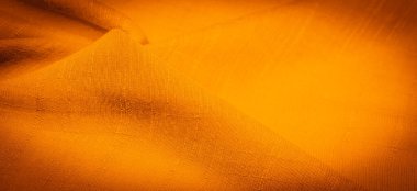 Arkaplan resminin dokusu, süsün dekoru, sarı sentlik ipek kumaşın sıcak rengi, dekoratif elementler ekleyerek bir şeyi daha çekici hale getirebilirsiniz.