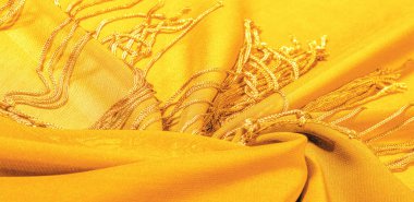 İpek kumaş Arka plan dokusu. Bu doğal sarı bir eşarp, şeffaf bir el ve harika bir sheen ile rayon yapılmış bu güzel naylon saten projeleriniz için mükemmel.