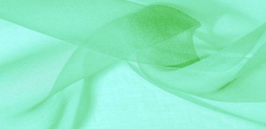 Yeşil ipek kumaş dokusu. Tasarımınız, giysileriniz ve posterleriniz için de mükemmel. Güzel proje aksanlarıyla yaratıcı ol. Bu kumaş senin ilham kaynağın..