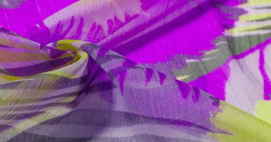 doku arkaplan deseni. Renkli dantelli ipek kumaş. Sarı mavi ve gri-mavi gözlükler. Dizaynınız, aksanınız, duvar kağıtlarınız, posterleriniz ve kartpostallarınız için mükemmel. Olasılıkların sonsuz.