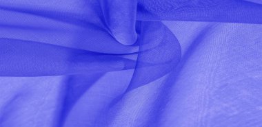 Mavi ipek kumaş dokusu. Tasarımınız, giysileriniz ve posterleriniz için de mükemmel. Güzel proje aksanlarıyla yaratıcı ol. Bu kumaş senin ilham kaynağın..