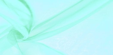 Yeşil ipek kumaş dokusu. Tasarımınız, giysileriniz ve posterleriniz için de mükemmel. Güzel proje aksanlarıyla yaratıcı ol. Bu kumaş senin ilham kaynağın..