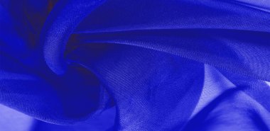 Mavi ipek kumaş dokusu. Tasarımınız, giysileriniz ve posterleriniz için de mükemmel. Güzel proje aksanlarıyla yaratıcı ol. Bu kumaş senin ilham kaynağın..