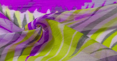 doku arkaplan deseni. Renkli dantelli ipek kumaş. Sarı mavi ve gri-mavi gözlükler. Dizaynınız, aksanınız, duvar kağıtlarınız, posterleriniz ve kartpostallarınız için mükemmel. Olasılıkların sonsuz.